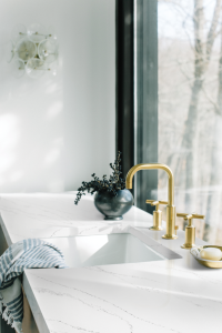 tranquility kitchen countertop with gold hardware